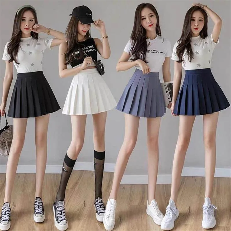 váy xếp ly ngắn phối với áo gì